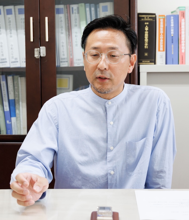 本間 隆氏