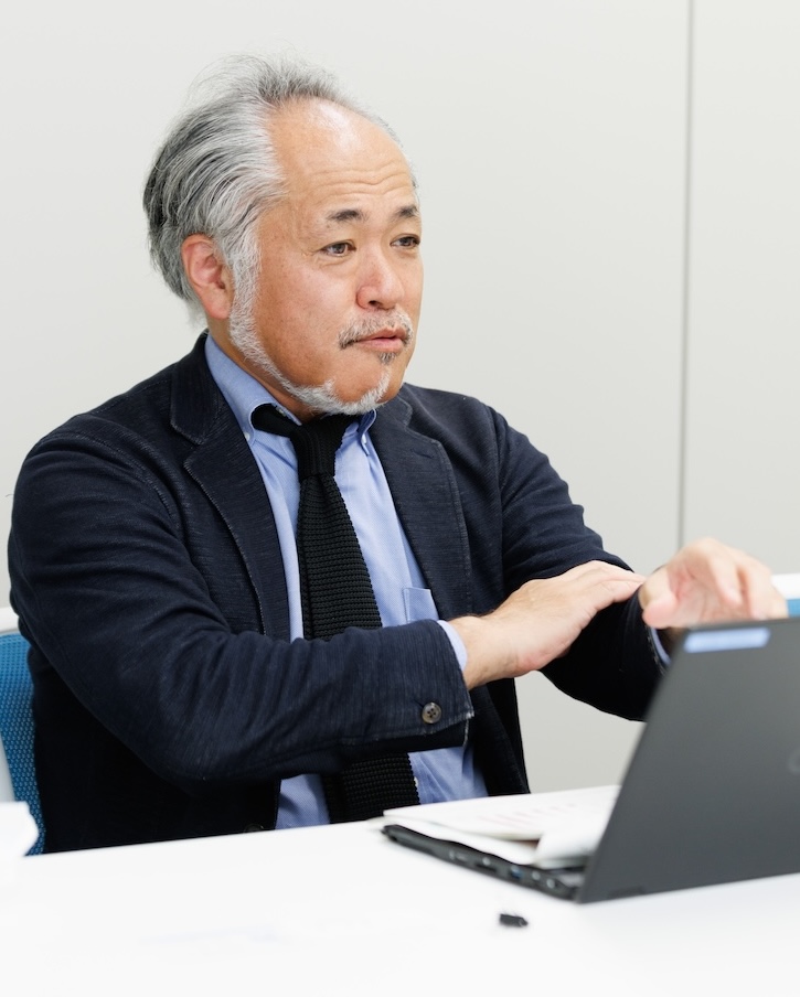 本間 隆氏